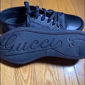 Black Gucci sneakers